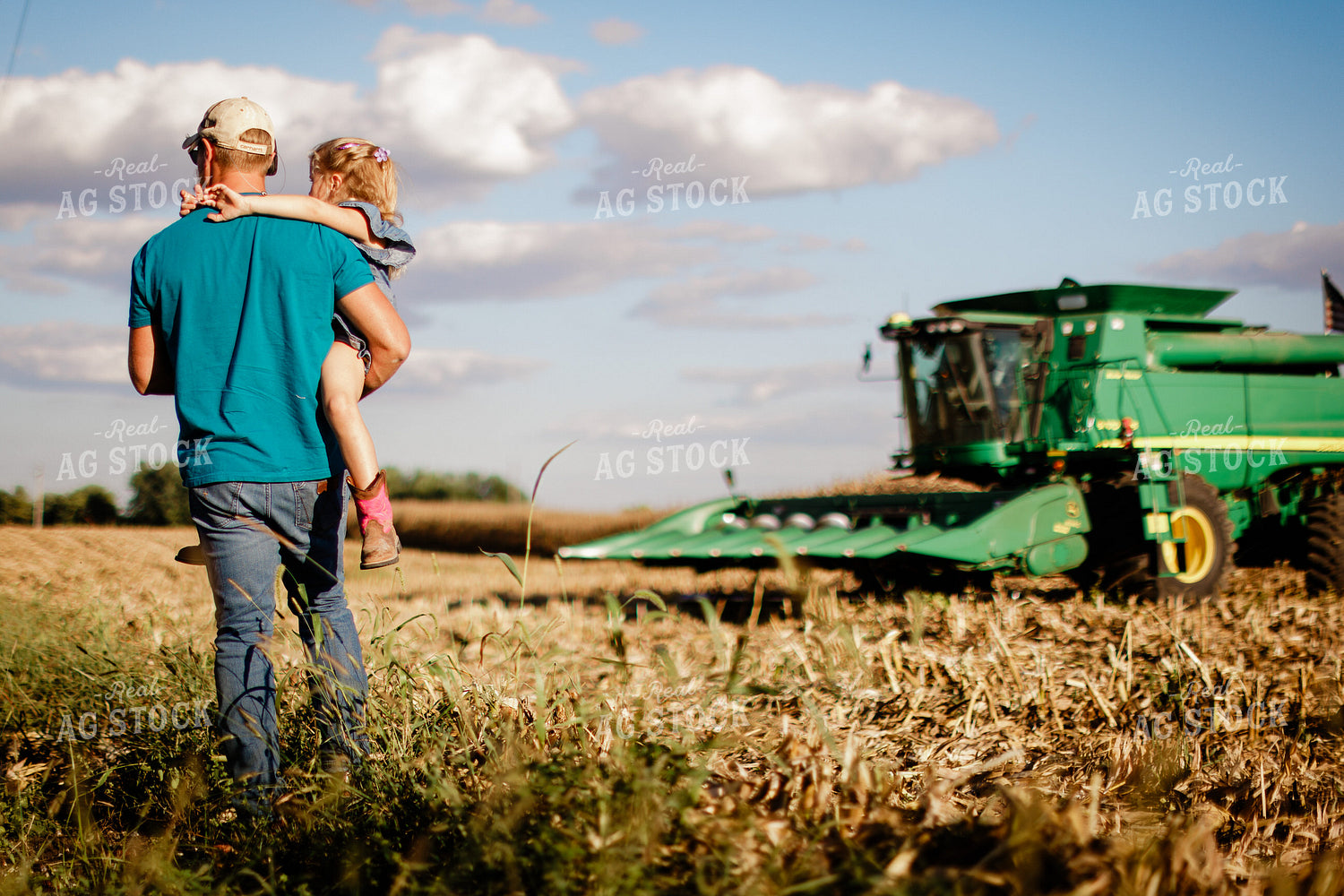 Farmer and Daughter in Field at Harvest 9361