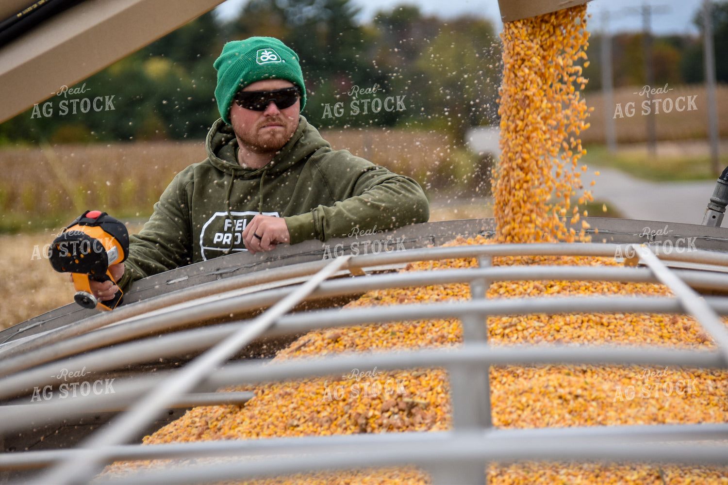 Farmer Watching Truck Fill 84216