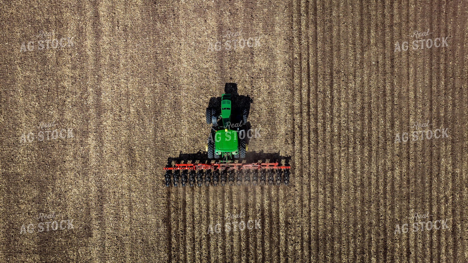 Aerial View of Tractor Strip Tilling Field 56628