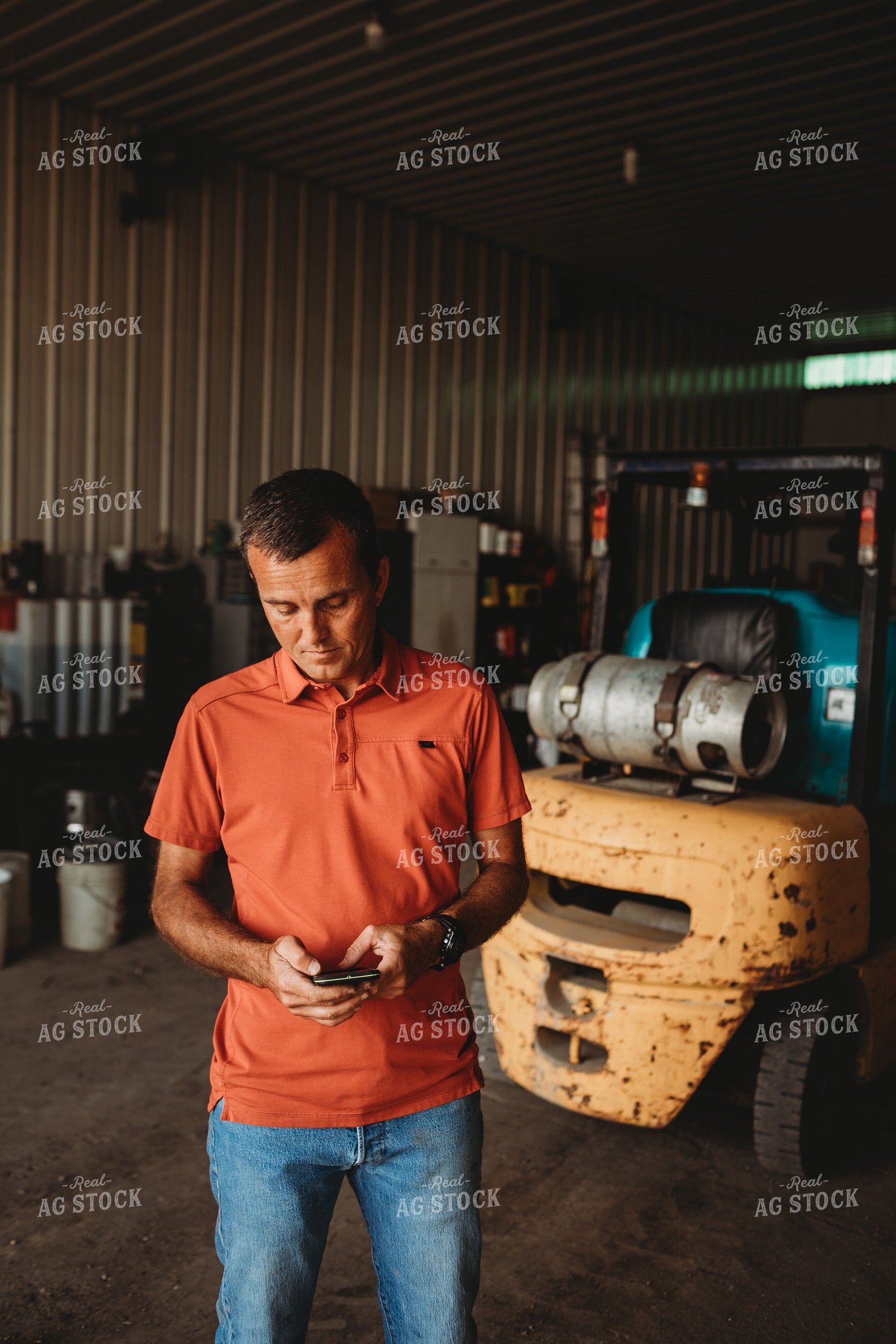 Farmer on Phone in Shop 4522