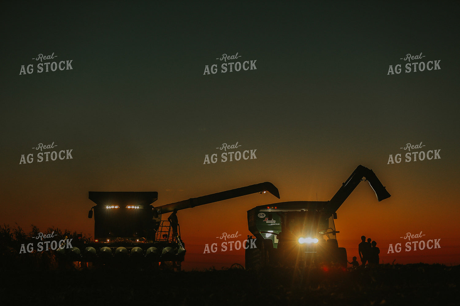 Family by Combine and Auger Cart at Sunset 5259