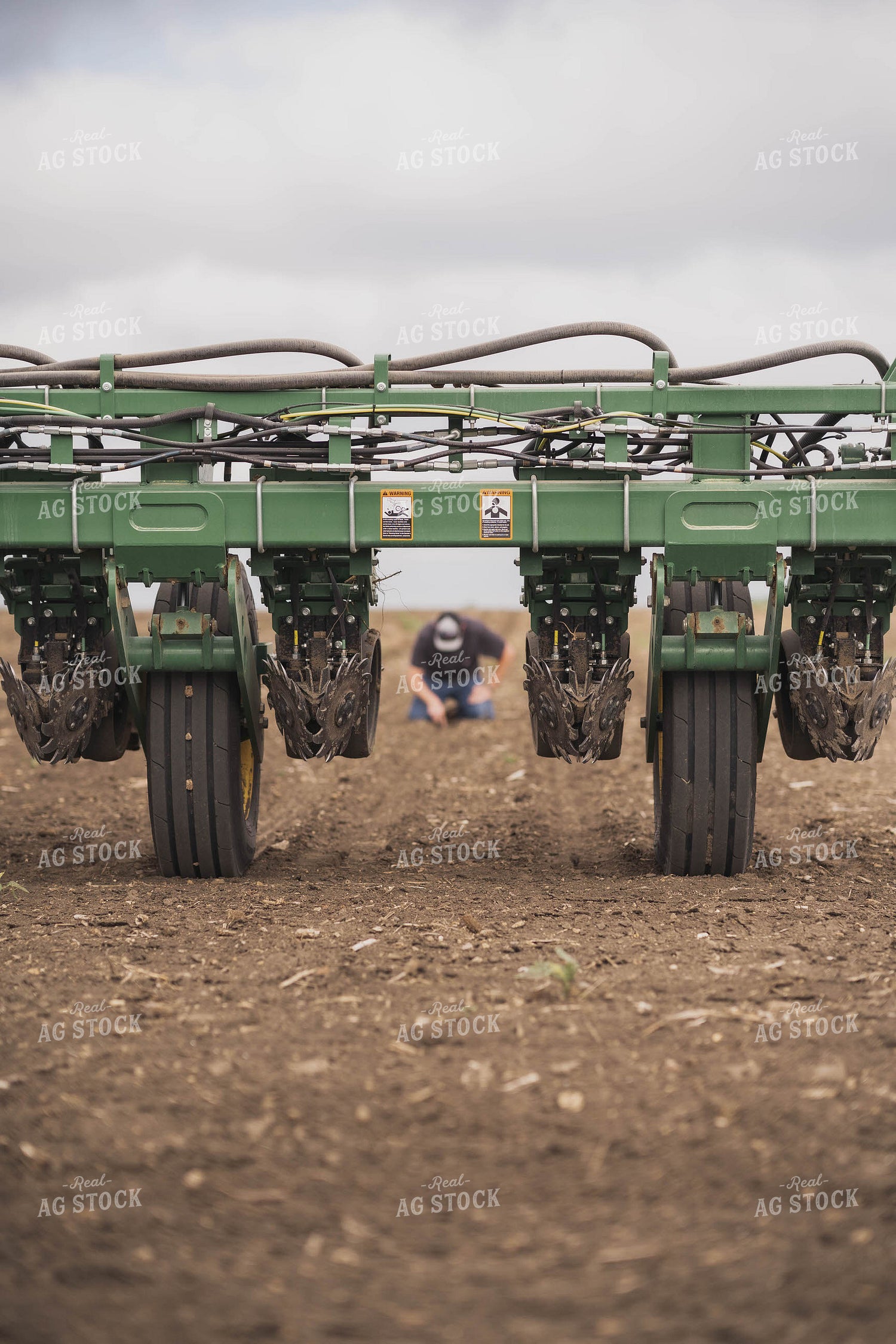 Planter in Field With Farmer 91004