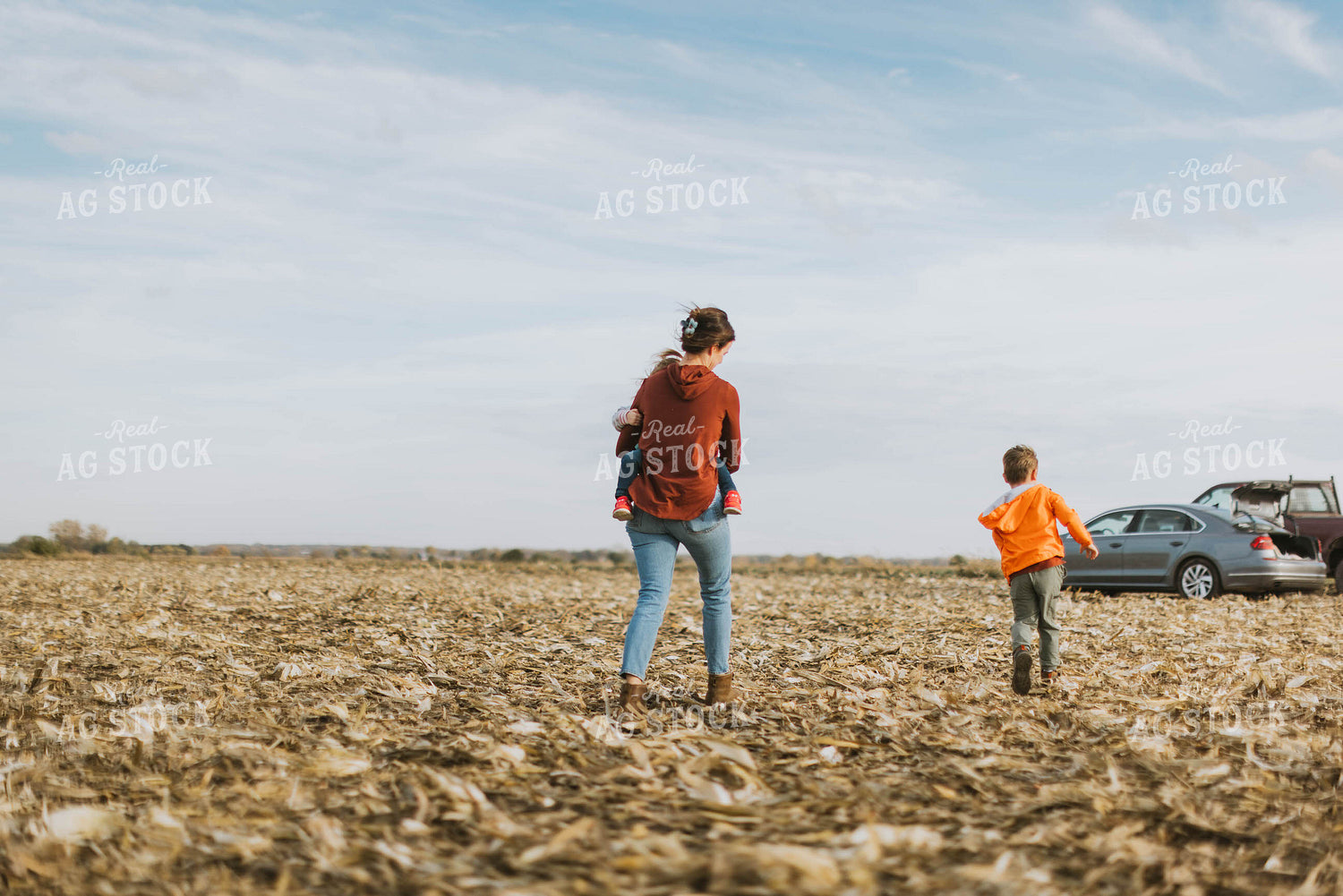 Female Farmer and Kids Playing in Cornfield 8524