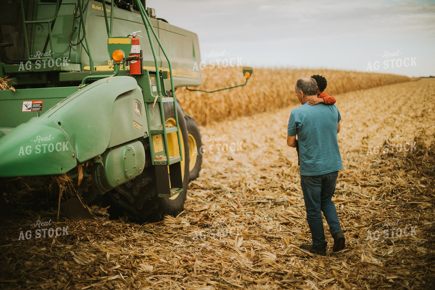 Farmer and Farm Kid in Field 6660