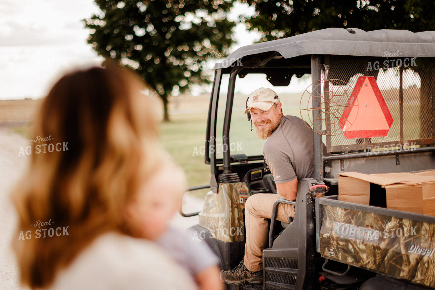 Farmer Driving Side by Side 9313