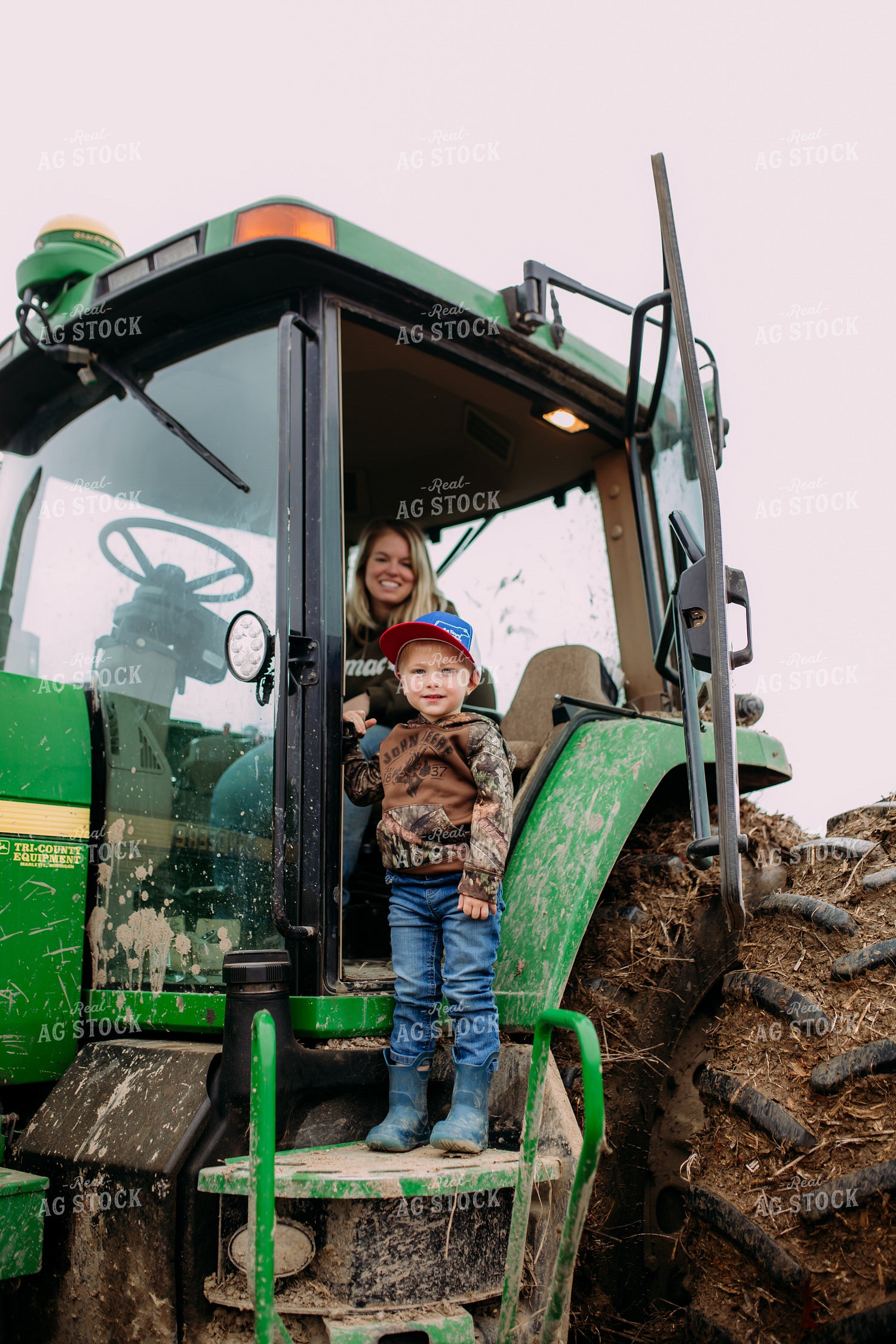 Farm Family in Tractor Cab 169068