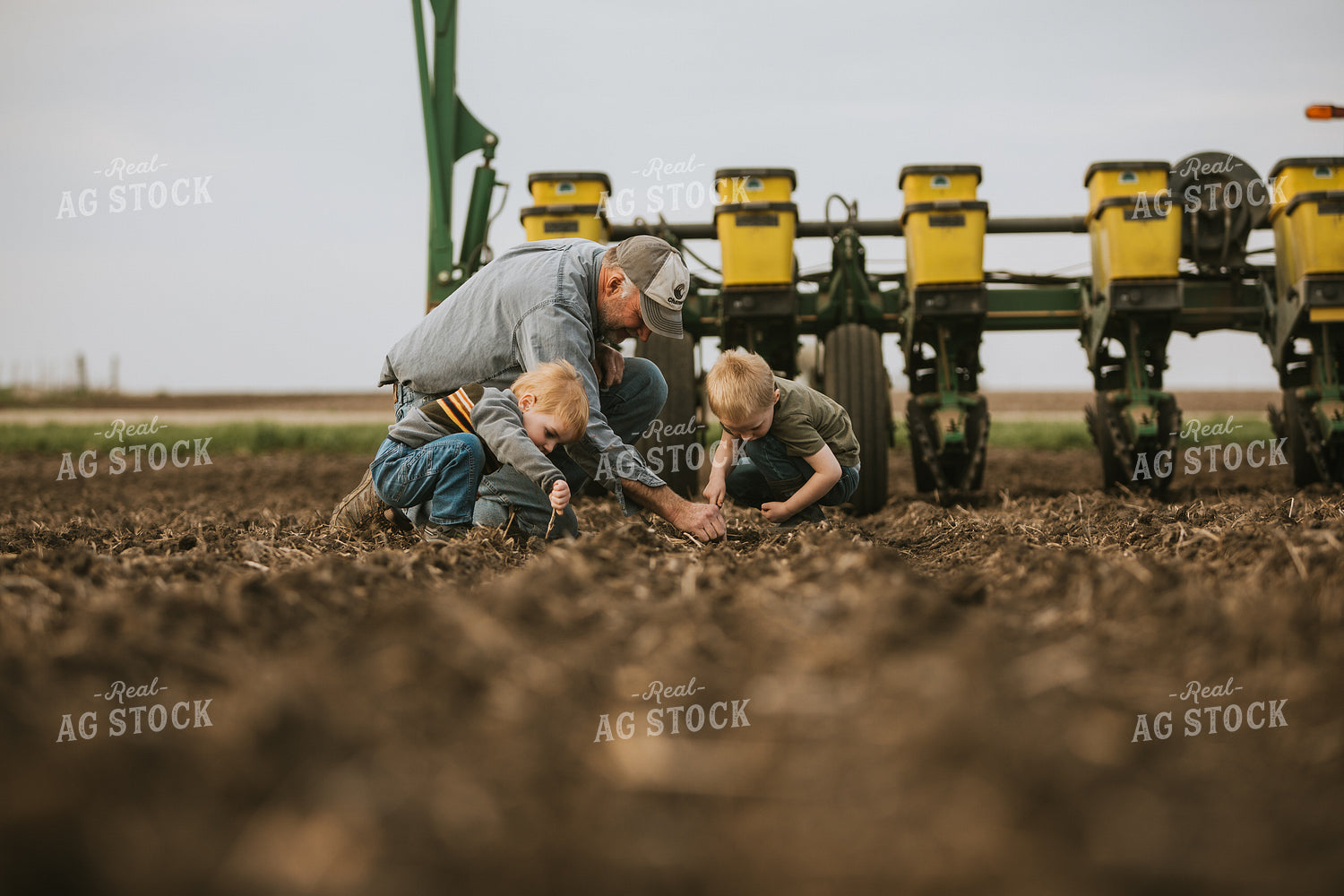 Farmer Checking Seed Depth with Farm Kids 5488
