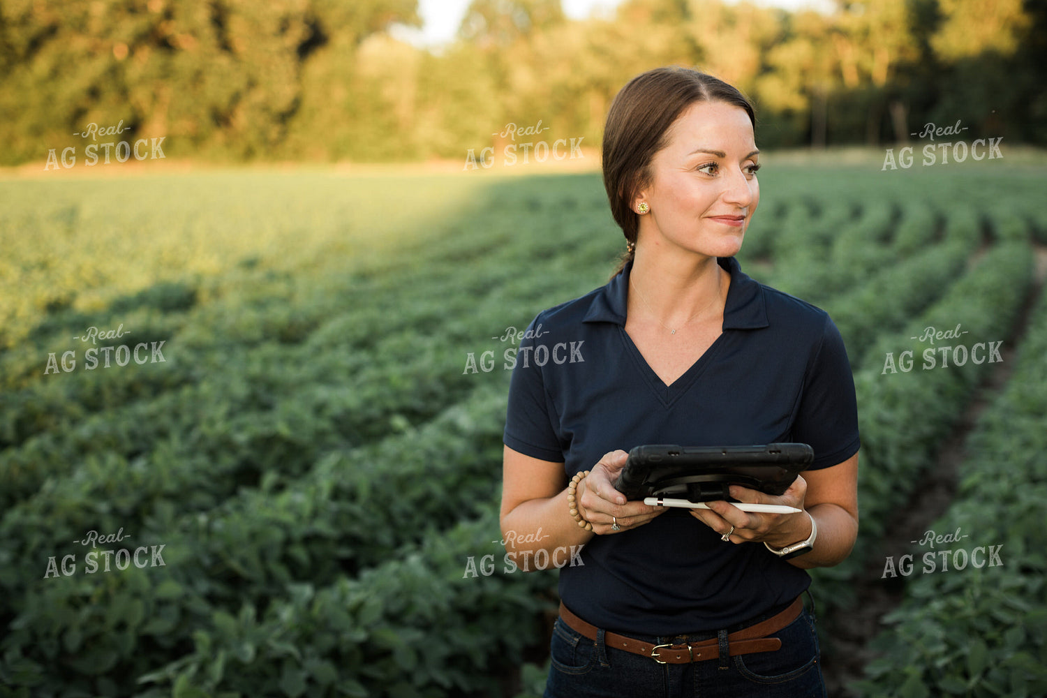 Agronomist or Farmer in Soybean Field with Tablet 6100