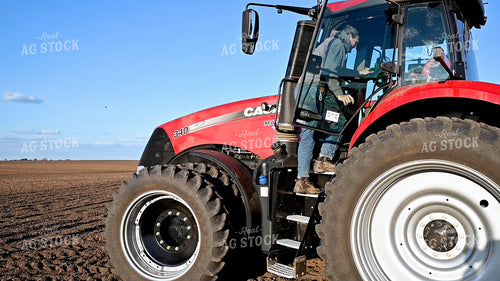 Farmer Climbing into Cab 25225
