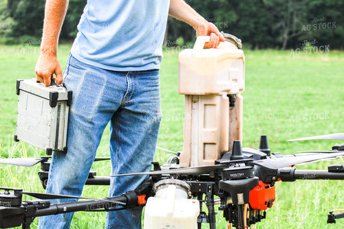 Farmer Refilling Drone 101021