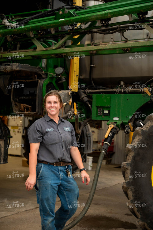 Farmer Filling Self-Propelled Sprayer 115753