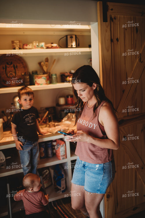 Farm Mom on Phone in Kitchen 5567