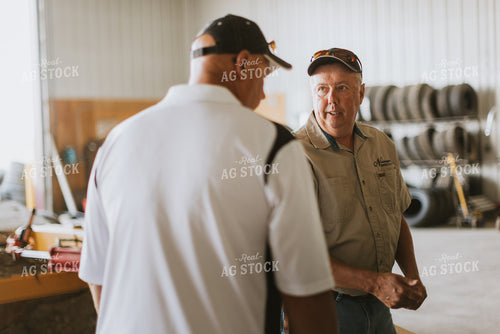 Farmers Talking in Shed 7742