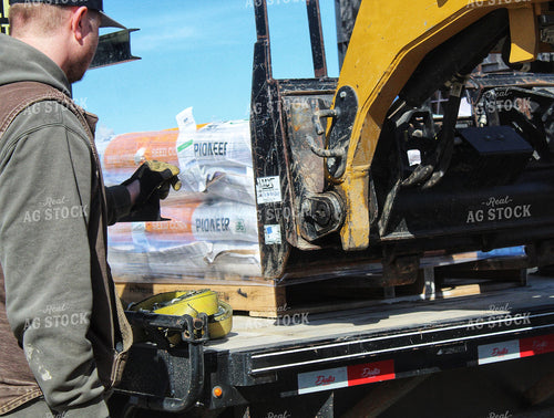 Seed Salesman Unloading Pro Boxes 141224