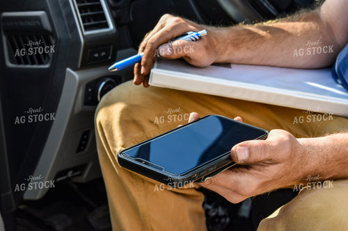 Farmer Holding Phone 84187