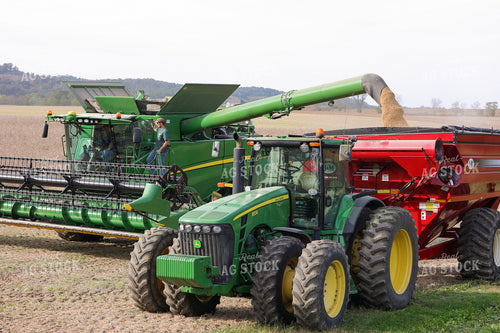 Combine Emptying Soybeans into Grain Cart 52253