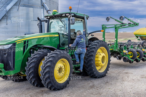 Farmer Getting in Tractor 124016