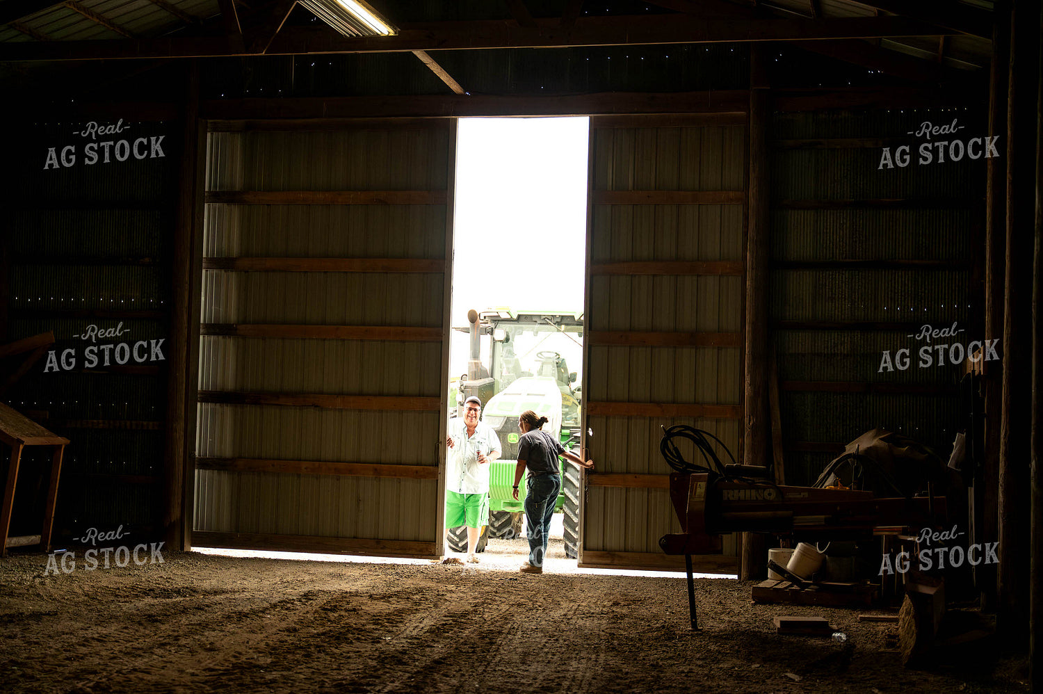 Female Farmer Opening Shed Doors 115710