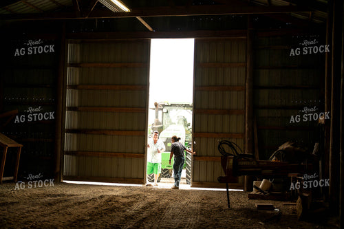 Female Farmer Opening Shed Doors 115710