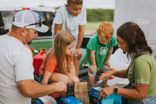 Farm Family Eating Dinner on the Tailgate 8755