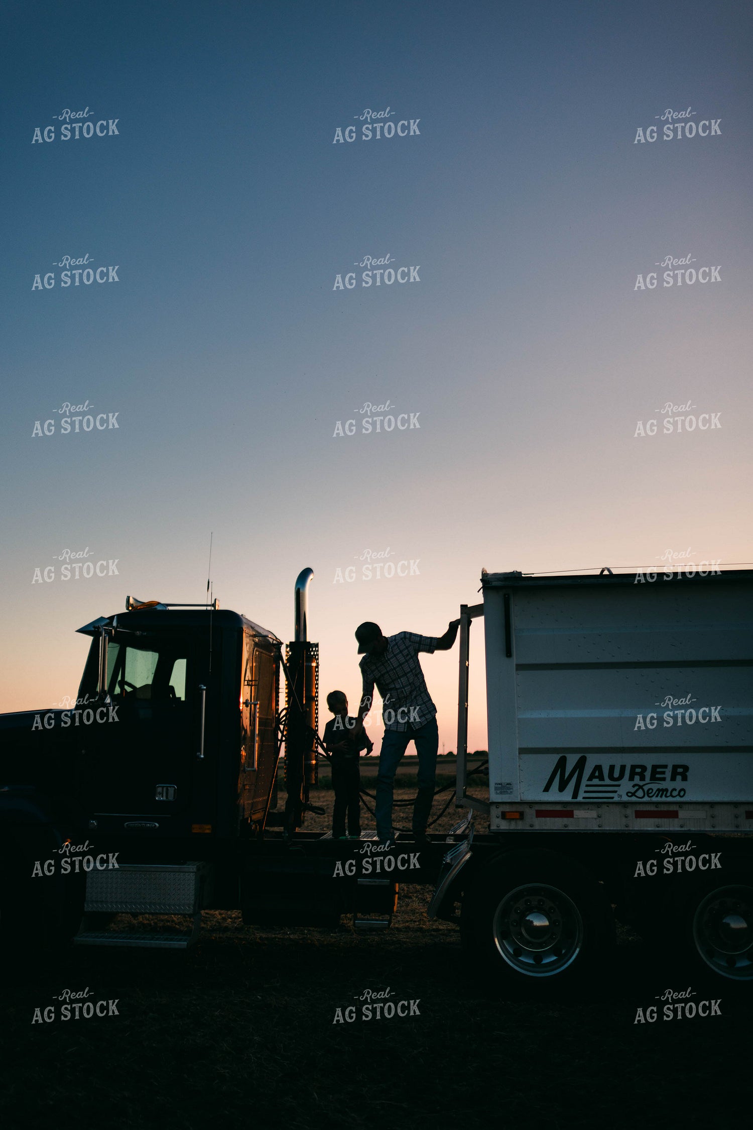 Farmer and Son Climbing on Semi Trailer 8650
