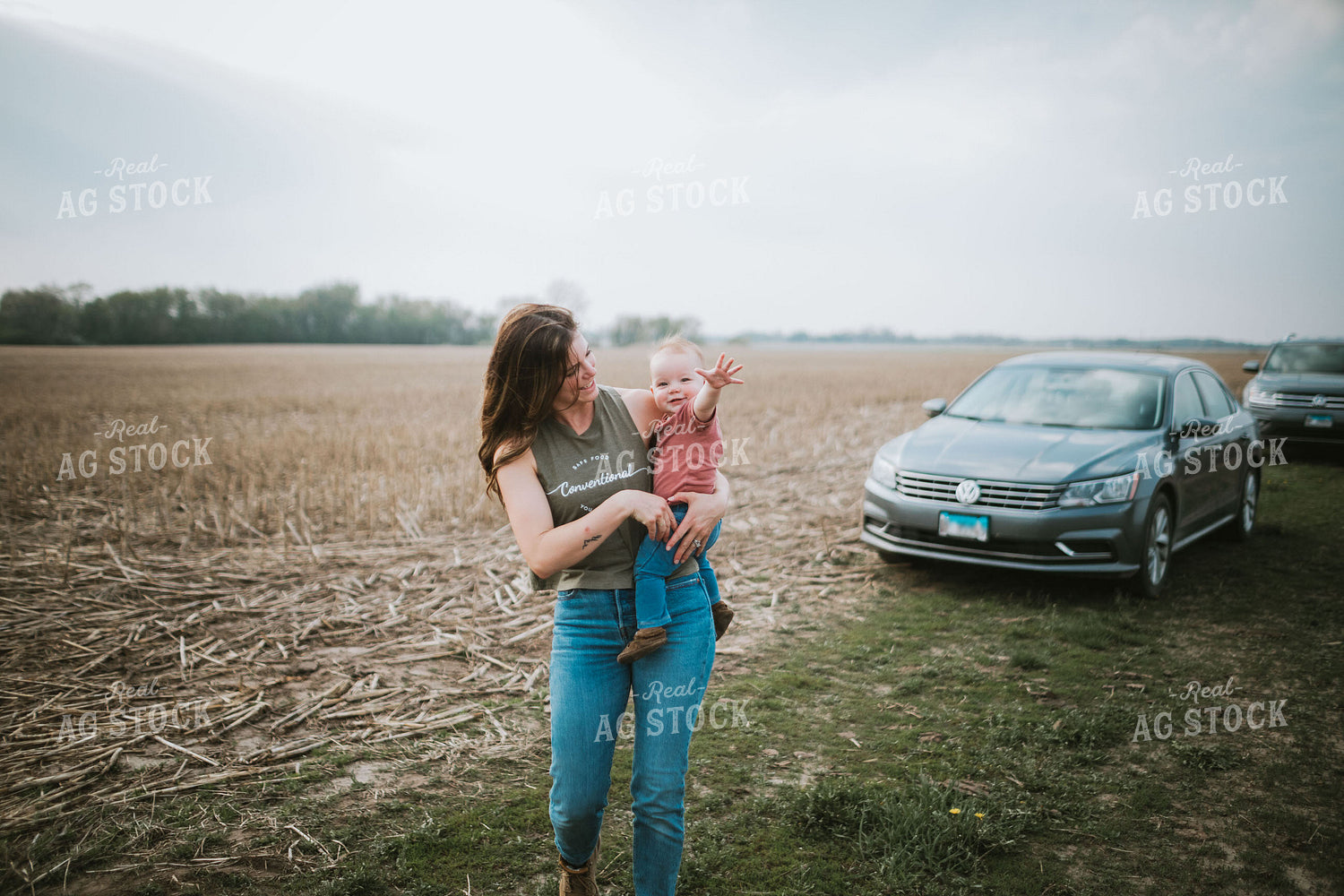 Farm Mom and Kid Arriving at Field During Planting 5601