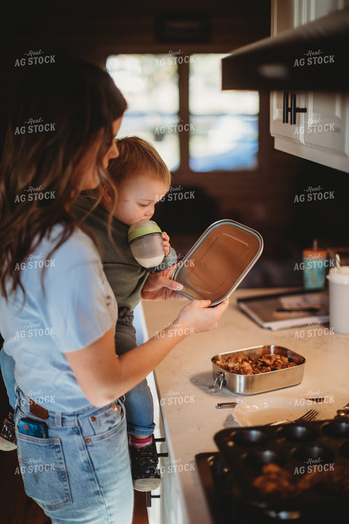 Farm Mom and Son Getting Food 6810