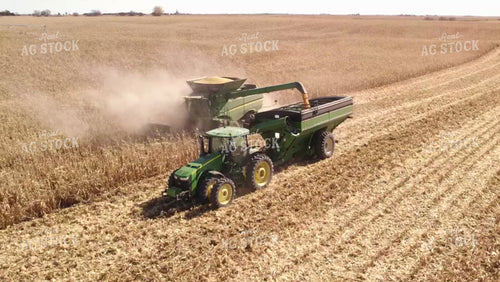 Aerial of Corn Harvest Combine Unloading 114037