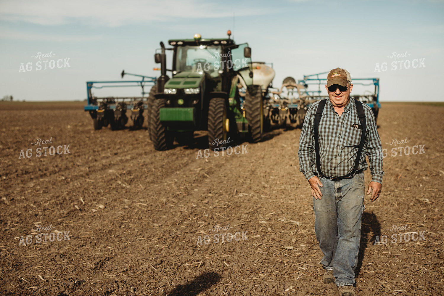 Farmer Walking Away from Tractor and Planter 4188