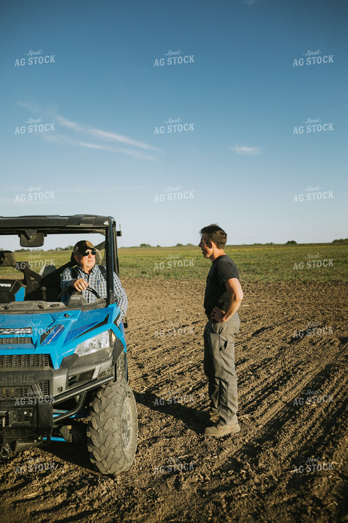 Farmers in Field with UTV 4255