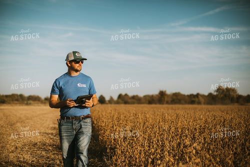 Farmer in Field with Tablet 7176