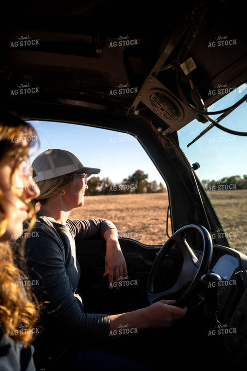 Female Farmers Moving Cattle with Side by Side 115477