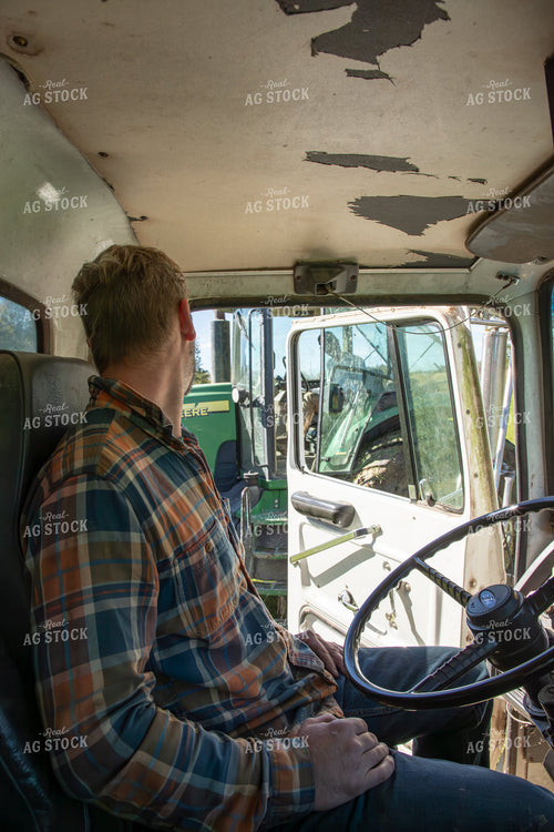 Farmer in Semi Cab 142012