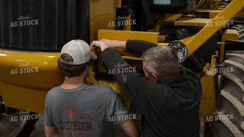 Farmers Fix Self-Propelled Sprayer