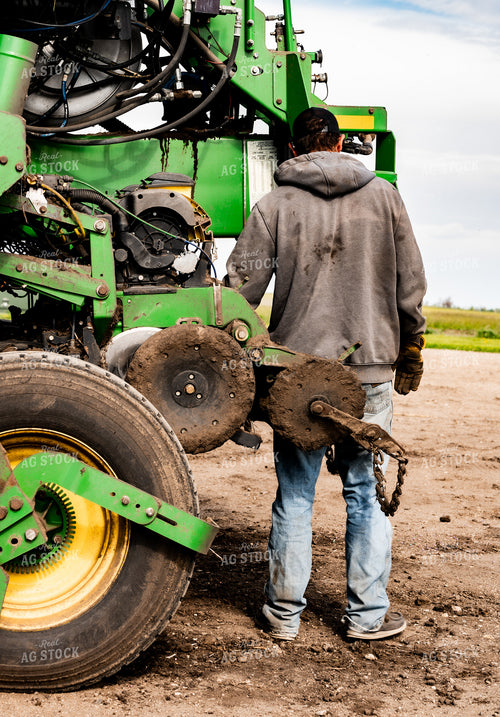 Farmer Working on Planter 185222