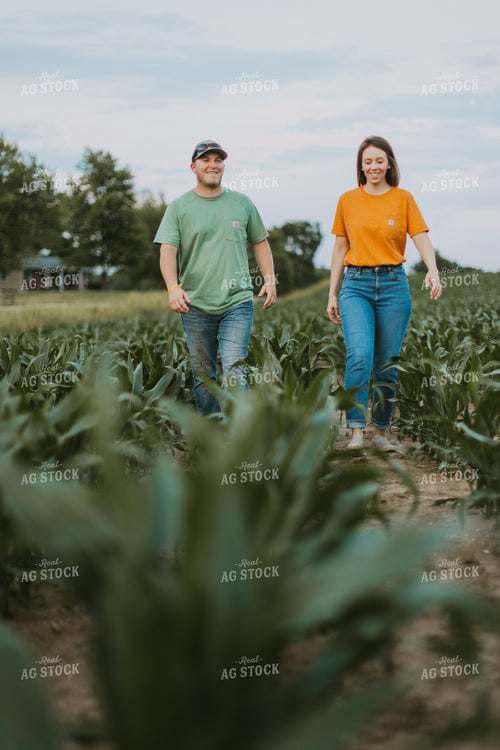 Farmers Scouting Corn Field 7835