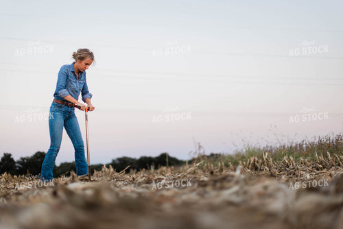 Female Farmer Taking Soil Sample 8383