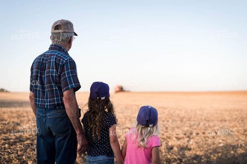 Farmer and Farm Kids in Field 115030