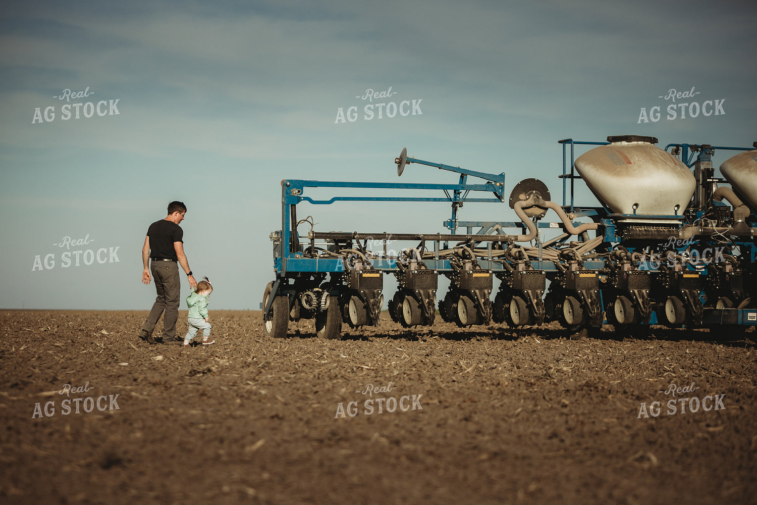 Farmer with Daughter and Planter 4206