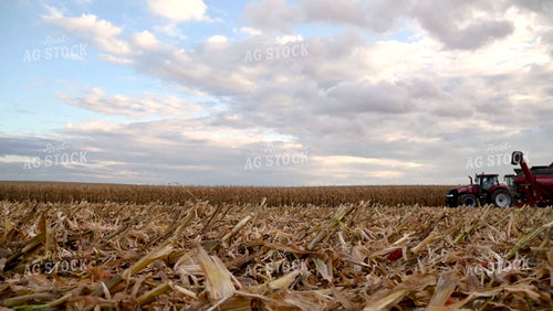 Combine Unloading Corn on the go into an Auger Wagon - 487