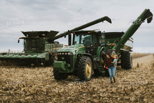 Farmers Climbing out of Harvest Equipment 8586