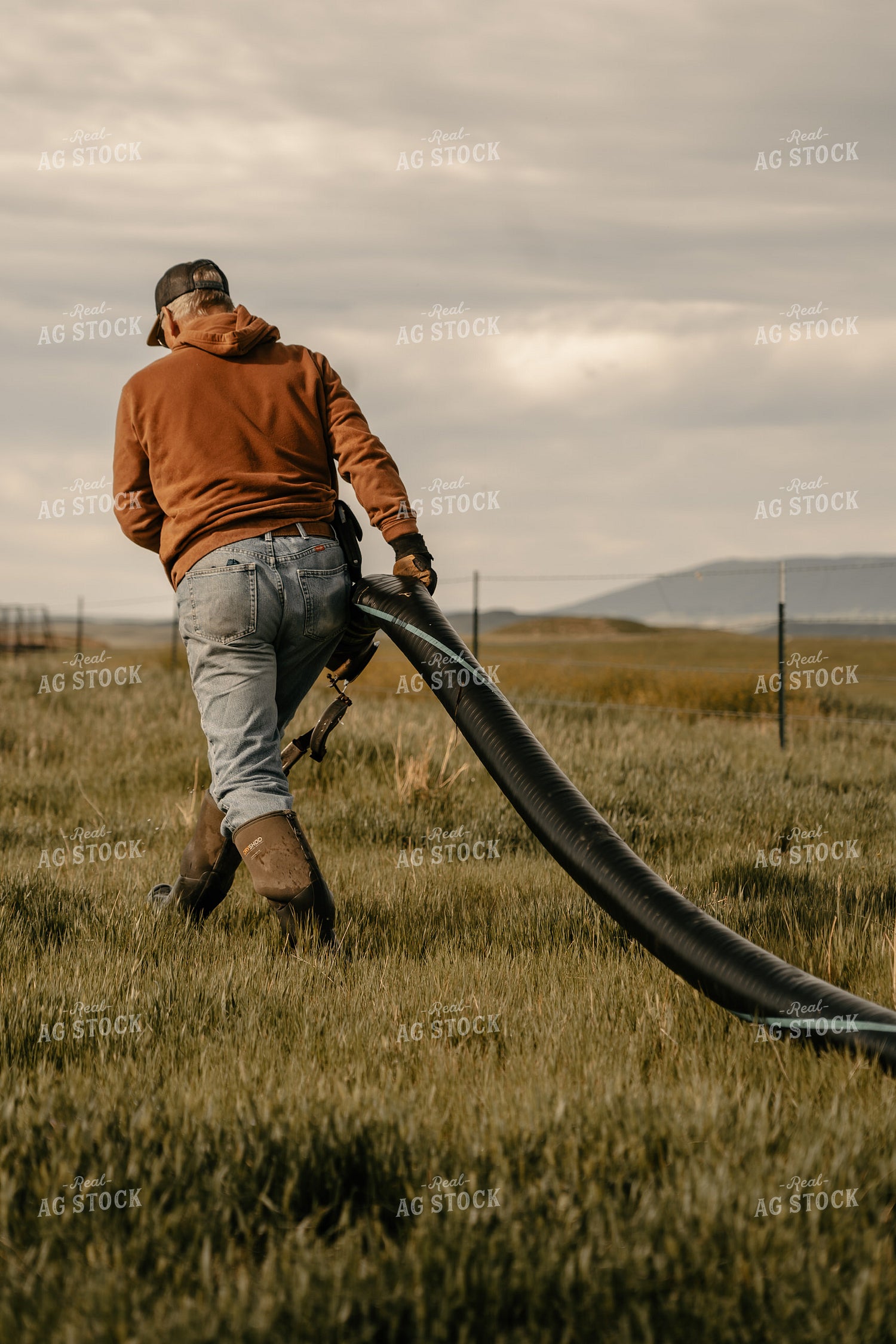 Farmer Working on Irrigation System 58224