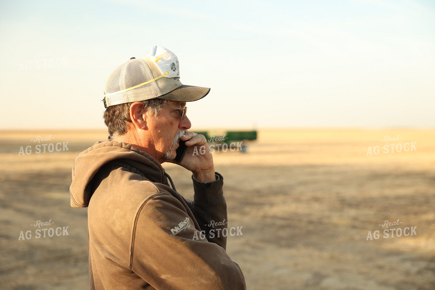 Farmer Talking on Phone 114105