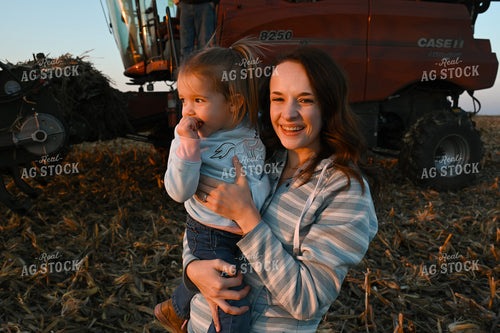 Farm Wife and Kid in Field 26324