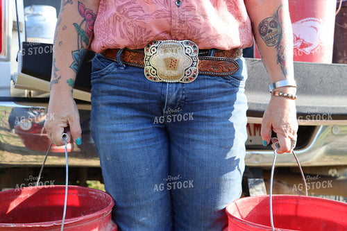 Farmer Holding Feed Buckets 201012