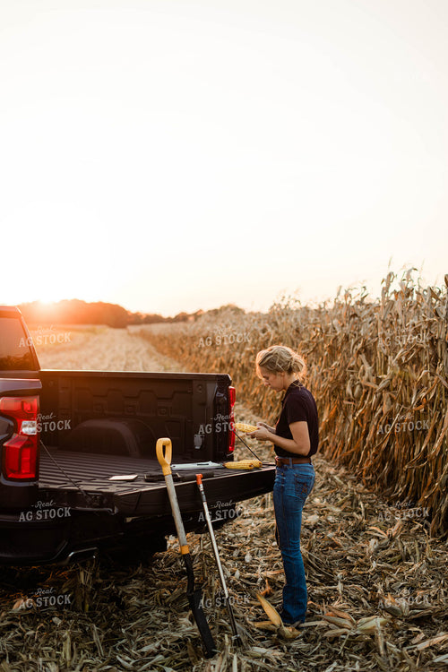 Female Agronomist Checking Corn 8345