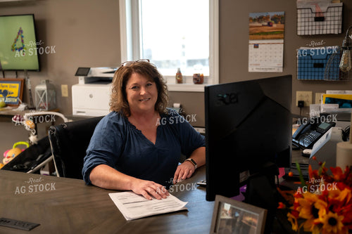 Female Farmer Working on Computer 115532