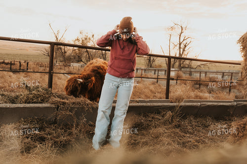 Female Rancher Doing Chores 61236