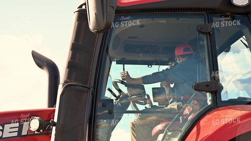Farmer in Tractor Cab 25228
