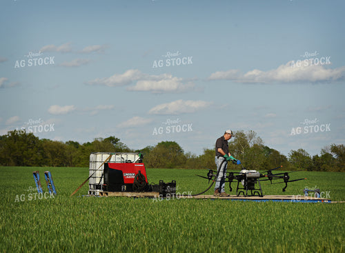 Farmers Filling Spray Drone 100025